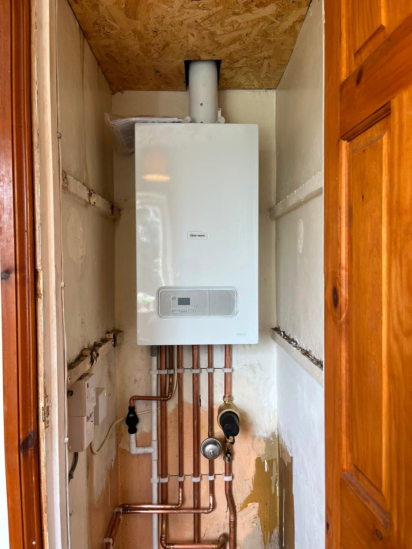 New Glow-worm combi boiler installed with neat copper pipework